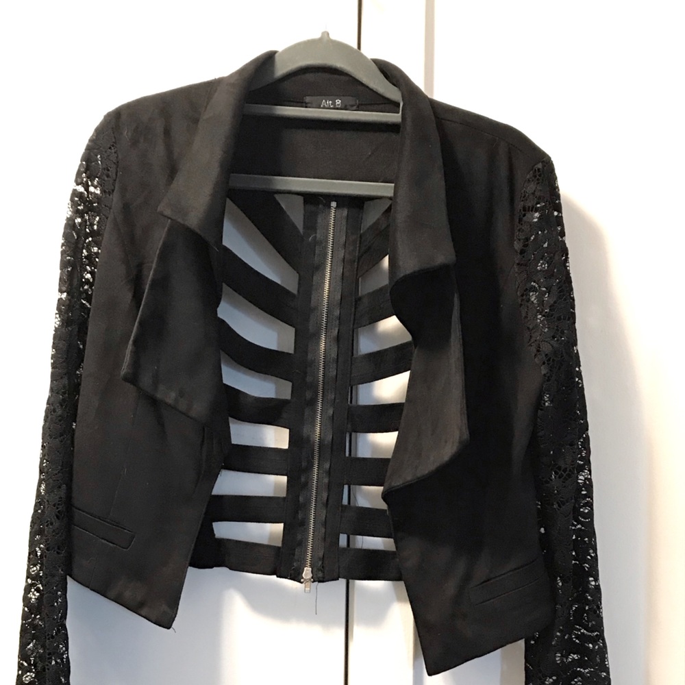 Faux Suede jacket with long lace sleeves.